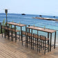 Mesa industrial con altura de barra, patas negras y mesa de bar con base metálica