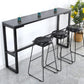 Bistrotisch im Industriestil mit Steinplatte und Metallsockel