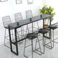 Bistrotisch im Industriestil mit Steinplatte und Metallsockel