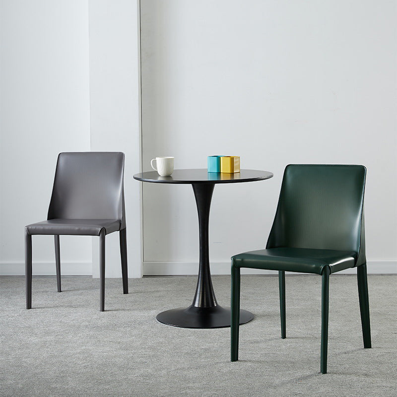 Moderne lederen eetstoelen armloze zijstoelen met metalen benen voor huisgebruik
