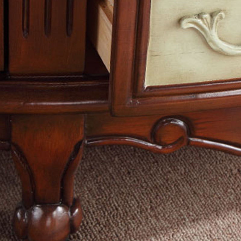 Cassettiera tradizionale in legno lavorato con 4 cassetti