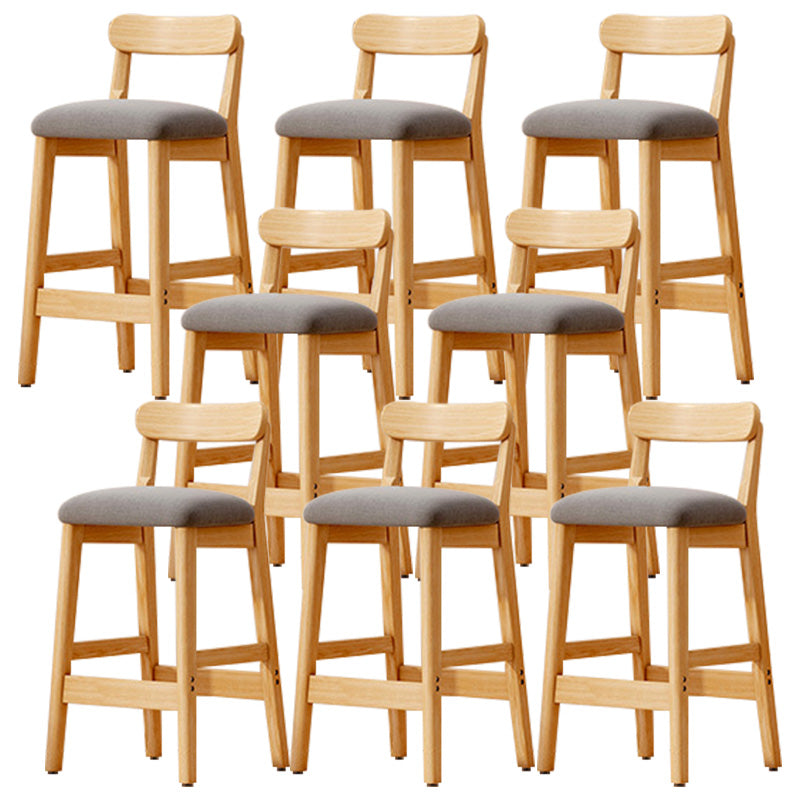 Taburete industrial de madera con altura de mostrador, taburete de bar sin brazos con cojín