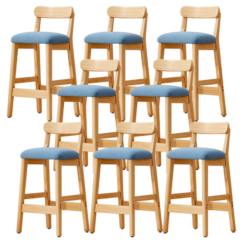 Taburete industrial de madera con altura de mostrador, taburete de bar sin brazos con cojín