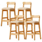 Taburete industrial de madera con altura de mostrador, taburete de bar sin brazos con cojín