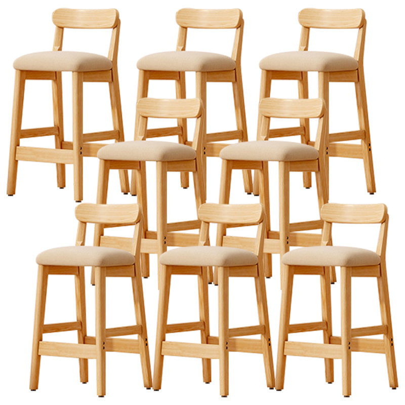 Taburete industrial de madera con altura de mostrador, taburete de bar sin brazos con cojín