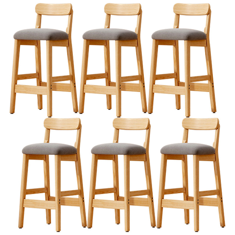 Taburete industrial de madera con altura de mostrador, taburete de bar sin brazos con cojín