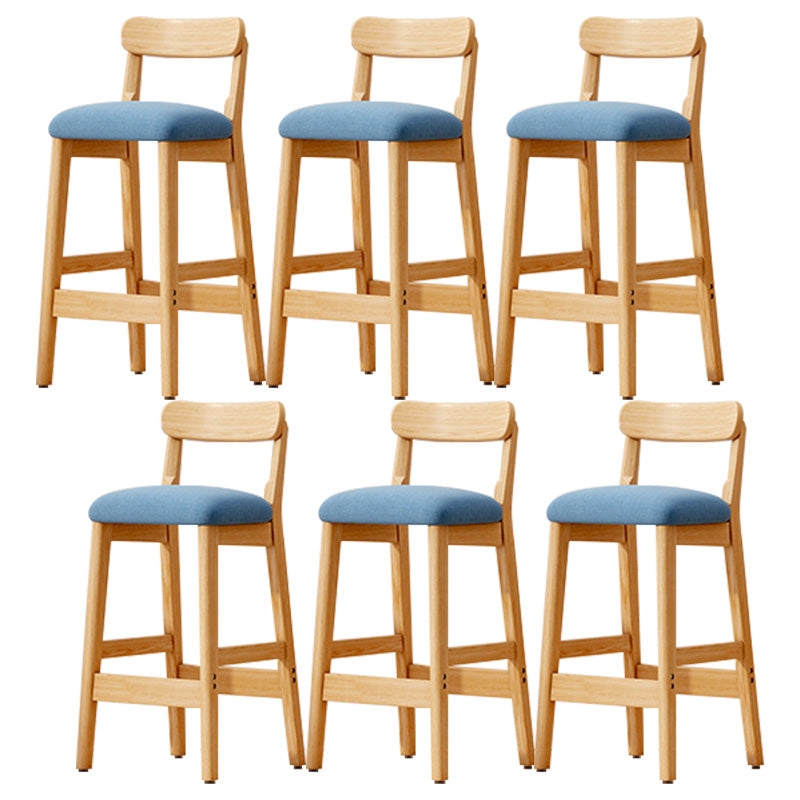 Taburete industrial de madera con altura de mostrador, taburete de bar sin brazos con cojín