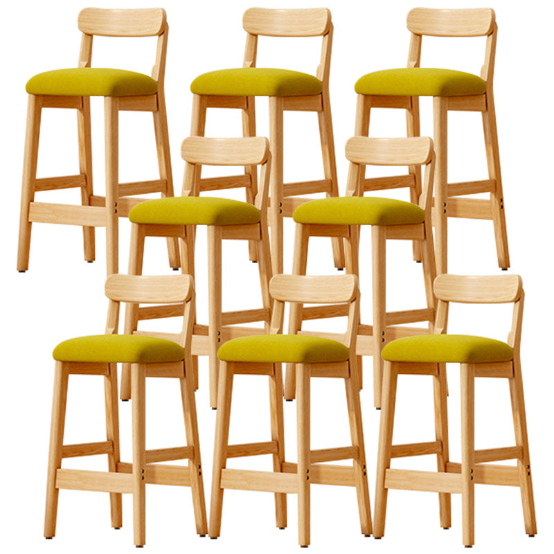 Taburete industrial de madera con altura de mostrador, taburete de bar sin brazos con cojín