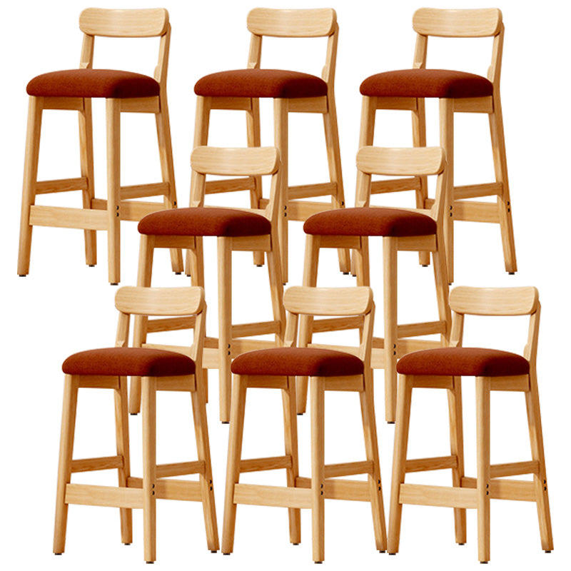 Taburete industrial de madera con altura de mostrador, taburete de bar sin brazos con cojín