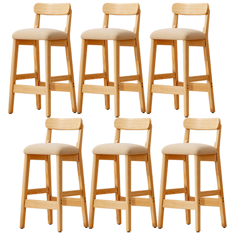 Taburete industrial de madera con altura de mostrador, taburete de bar sin brazos con cojín