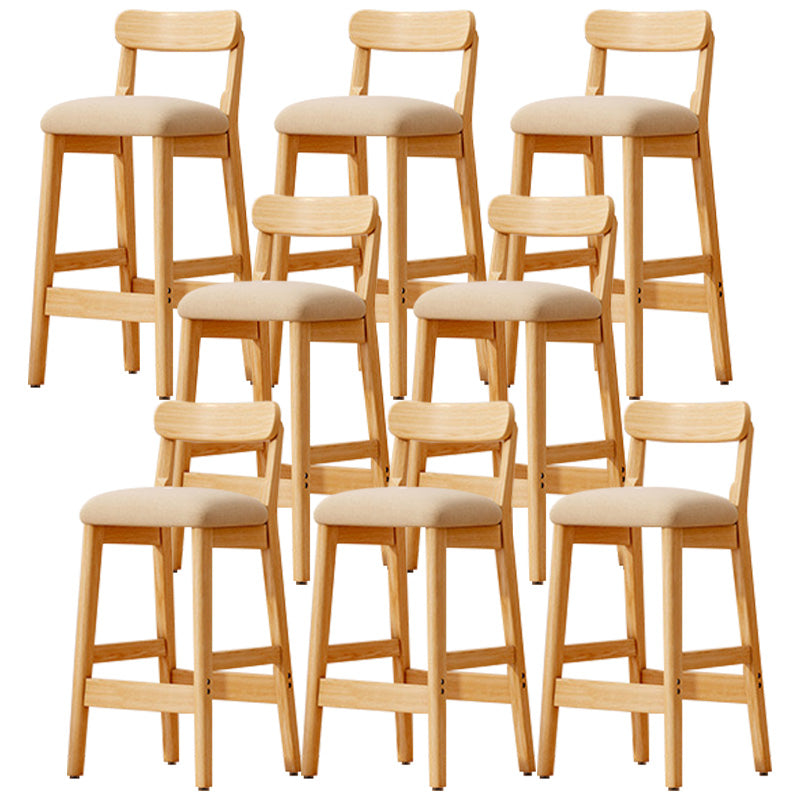 Taburete industrial de madera con altura de mostrador, taburete de bar sin brazos con cojín