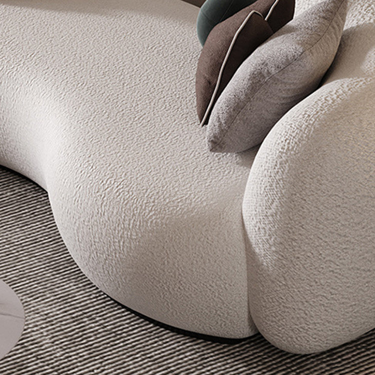 リビングルームのための現代の白いウール湾曲したソファの傾斜腕ソファ