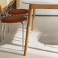 Table rectangulaire de style moderne en pierre frittée avec pieds en bois pour la maison