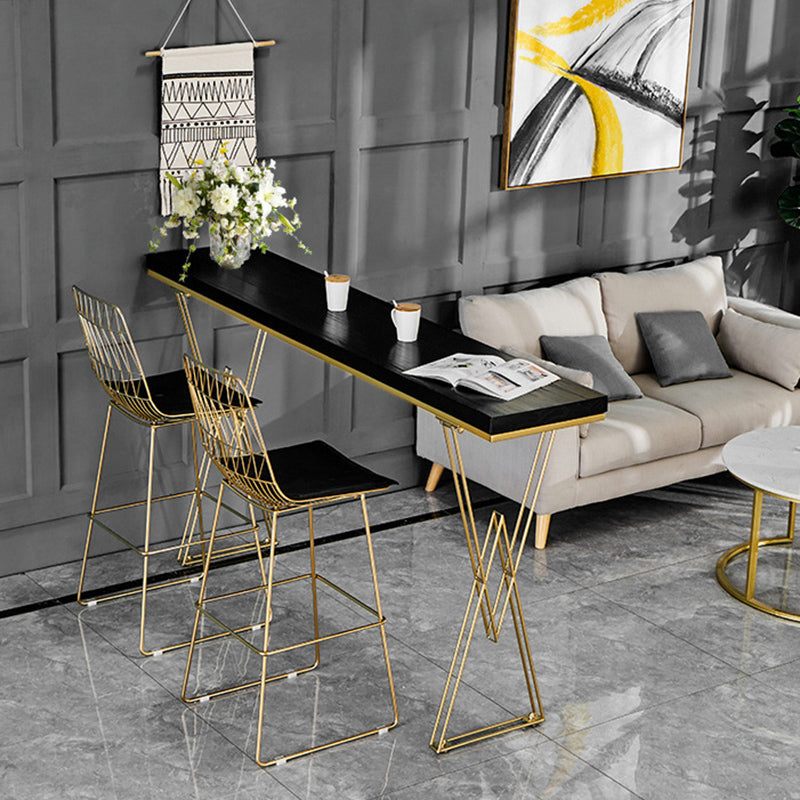 Glam Bar-height Table Black Solid Wood Top Bistro Pub Table with Gold Base 66.9"L x 15.7"W x 41.3"H Without Chairs Clearhalo 'Bar Furniture' 'Bar Tables' 'bar_tables' 'furn' 'furn_bar_tables' 'Furniture' 'Kitchen & Dining Furniture' 6384151