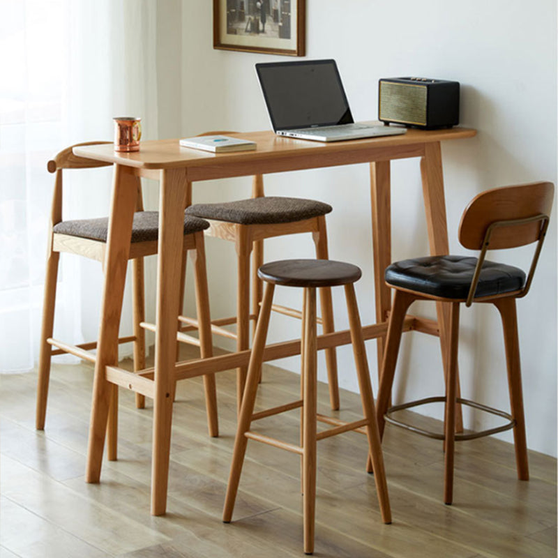 Modern Style Rectangle Bar Table Brown Solid Wood Bar Dining Table with Footrest 55.1"L x 17.7"W x 41.3"H Without Chairs Clearhalo 'Bar Furniture' 'Bar Tables' 'bar_tables' 'furn' 'furn_bar_tables' 'Furniture' 'Kitchen & Dining Furniture' 6384736