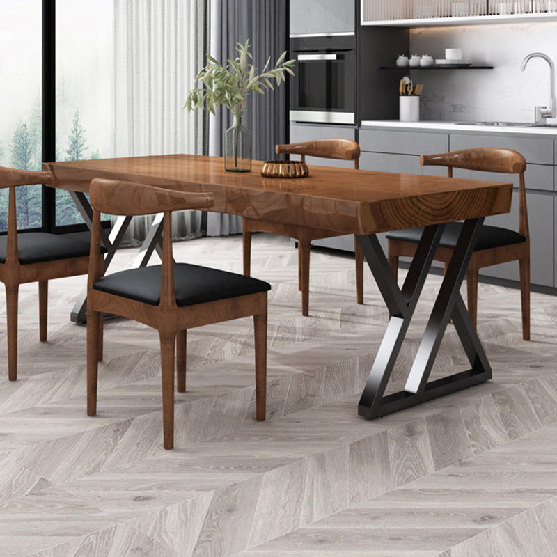 Tavolo da pranzo industriale rettangolare con piano in legno marrone scuro e base in metallo