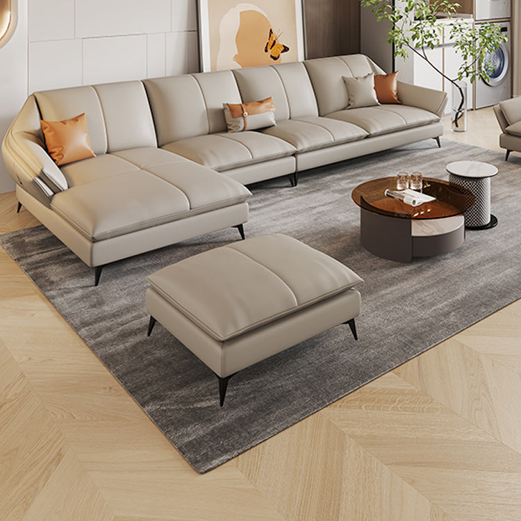 Sofa sectionnel contemporain sectionnel en cuir beige avec oreillers