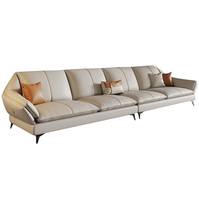 Sofa sectionnel contemporain sectionnel en cuir beige avec oreillers