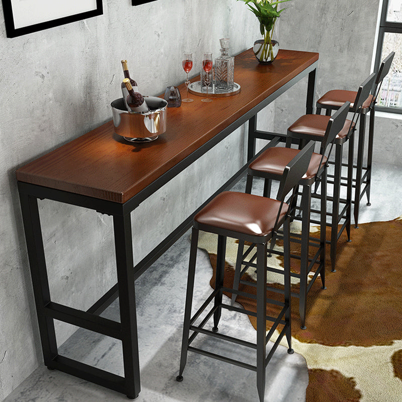 Tavolo industriale da bar con piano in legno massello, tavolo da pub bistrot con base nera