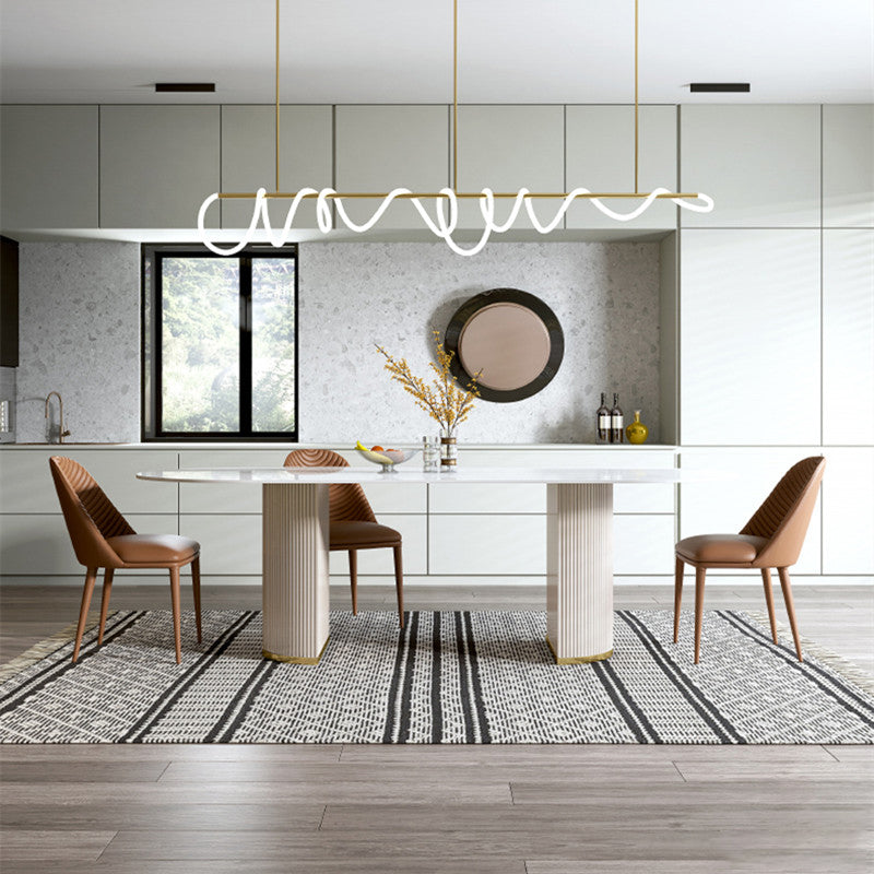Luxe ovale eettafel Stenen eettafel met dubbel voetstuk