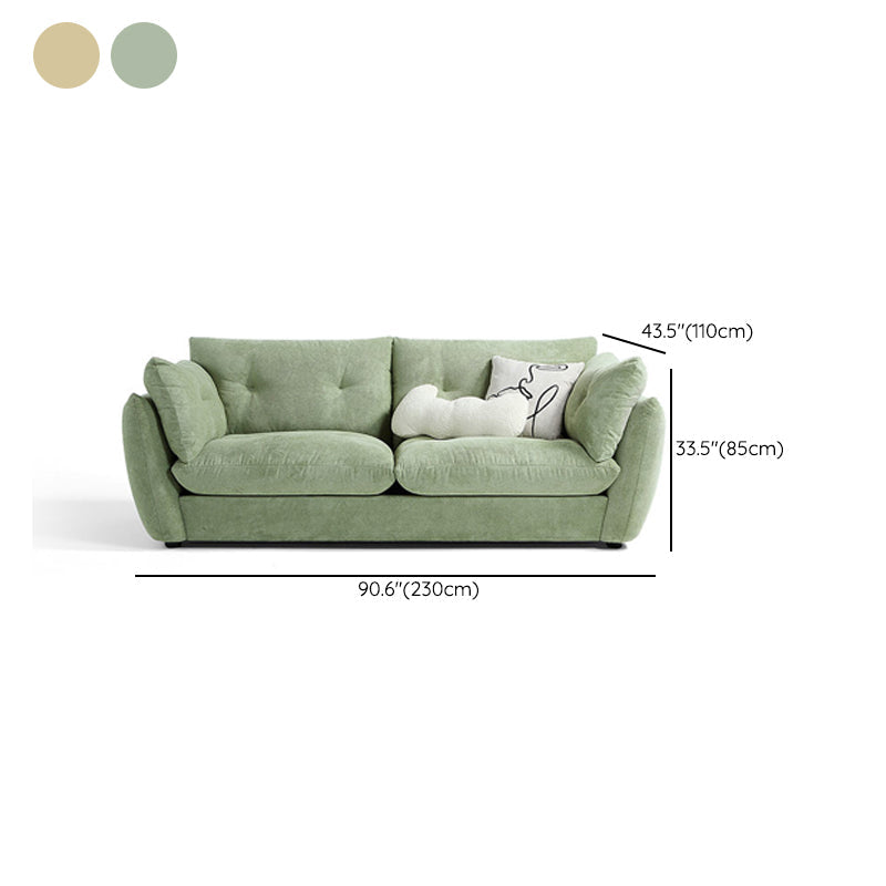 Divano braccio svasato cuscini standard a sedere in oro e verde chiaro