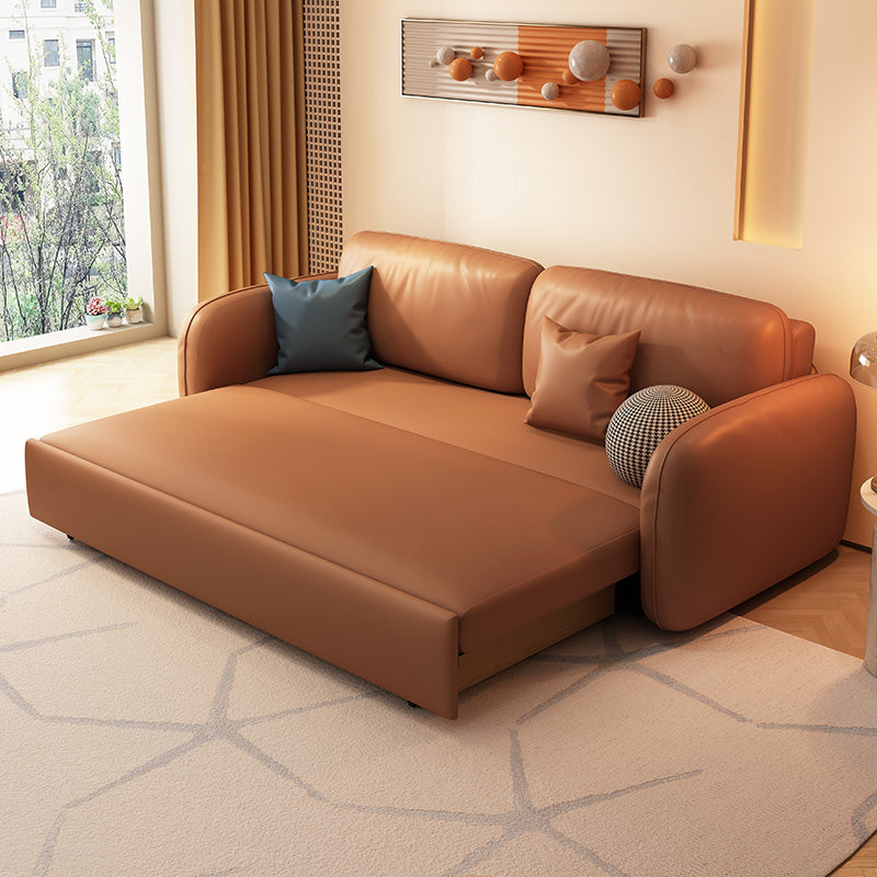 茶色の枕付きフェイクレザーソファー