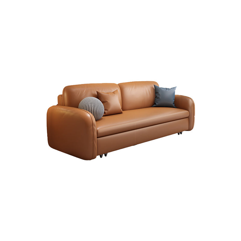 茶色の枕付きフェイクレザーソファー