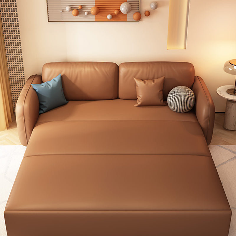 茶色の枕付きフェイクレザーソファー