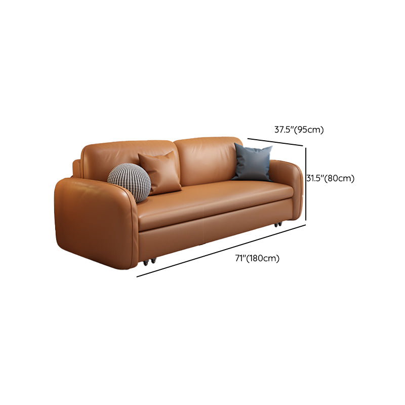 茶色の枕付きフェイクレザーソファー