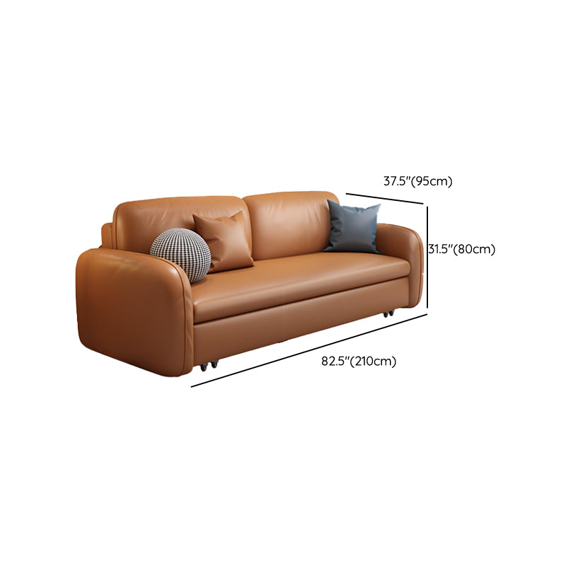 茶色の枕付きフェイクレザーソファー