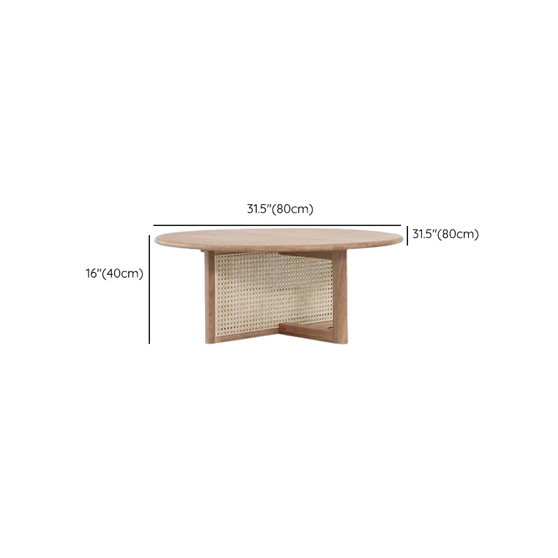 Tavolino scandinavo rotondo con gambe incrociate in legno di pino