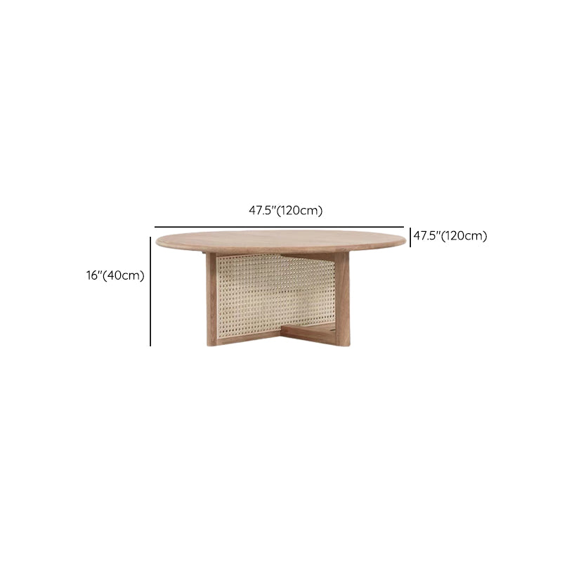 Tavolino scandinavo rotondo con gambe incrociate in legno di pino