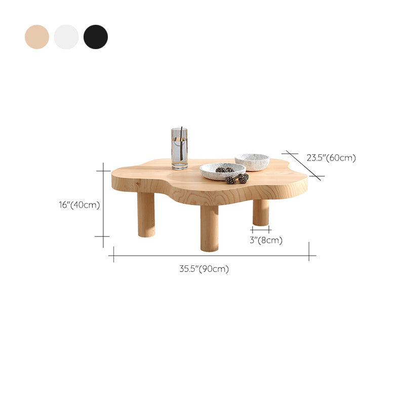 Table basse scandinave de forme libre avec 3 pieds en bois de pin