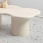 Mesa de centro escandinava de forma libre con base de madera en beige
