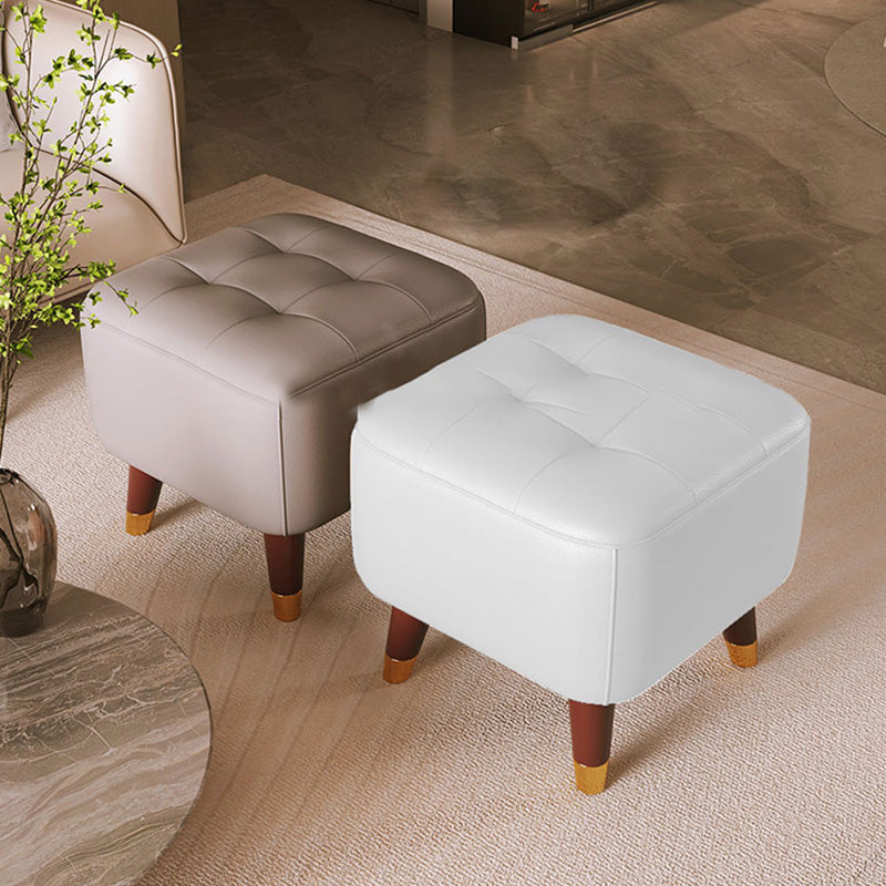 Otomático otomático de cuero genuino moderno otomano de mediados de siglo con patas de silla