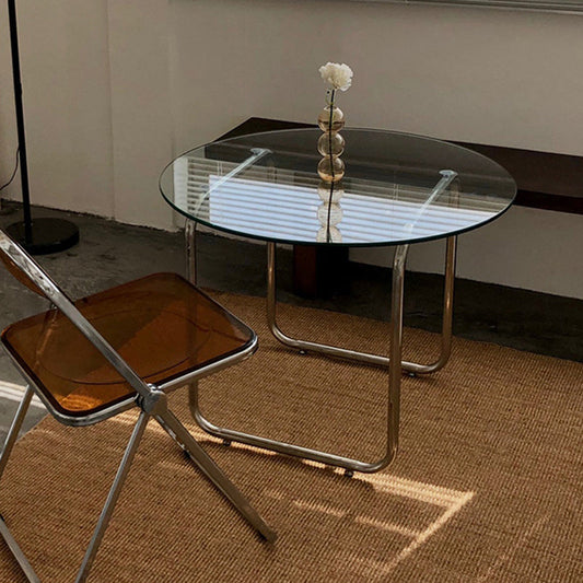 Mesa de café de vidrio redondo moderno con basura de acero inoxidable de trineo manchado