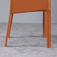 Chaise de bras moderne en cuir chaise à manger intérieure avec base en métal