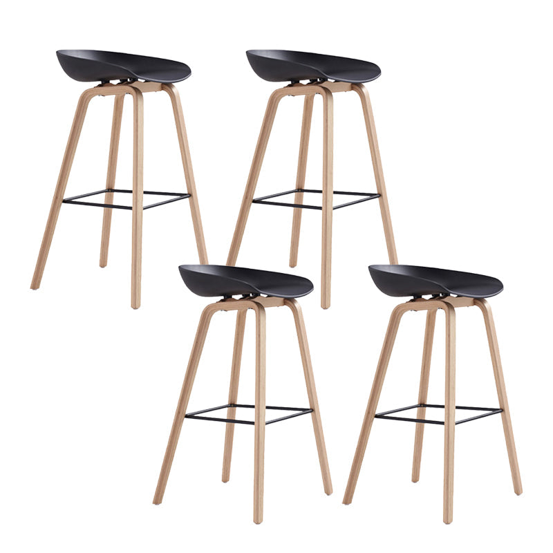 Indoor Plastic Bucket Seat Scandinavian Armless Bar Height Stool with Wood Legs Black 4 Piece Set Clearhalo 'Bar Furniture' 'Bar Stools' 'bar_stools' 'furn' 'furn_bar_stools' 'Furniture' 'Kitchen & Dining Furniture' 6556314