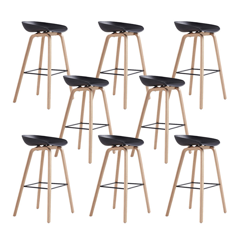 Indoor Plastic Bucket Seat Scandinavian Armless Bar Height Stool with Wood Legs Black 8 Piece Set Clearhalo 'Bar Furniture' 'Bar Stools' 'bar_stools' 'furn' 'furn_bar_stools' 'Furniture' 'Kitchen & Dining Furniture' 6556318