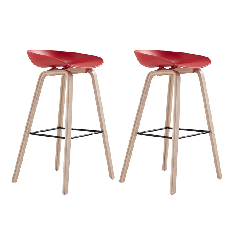 Indoor Plastic Bucket Seat Scandinavian Armless Bar Height Stool with Wood Legs Red 2 Piece Set Clearhalo 'Bar Furniture' 'Bar Stools' 'bar_stools' 'furn' 'furn_bar_stools' 'Furniture' 'Kitchen & Dining Furniture' 6556324