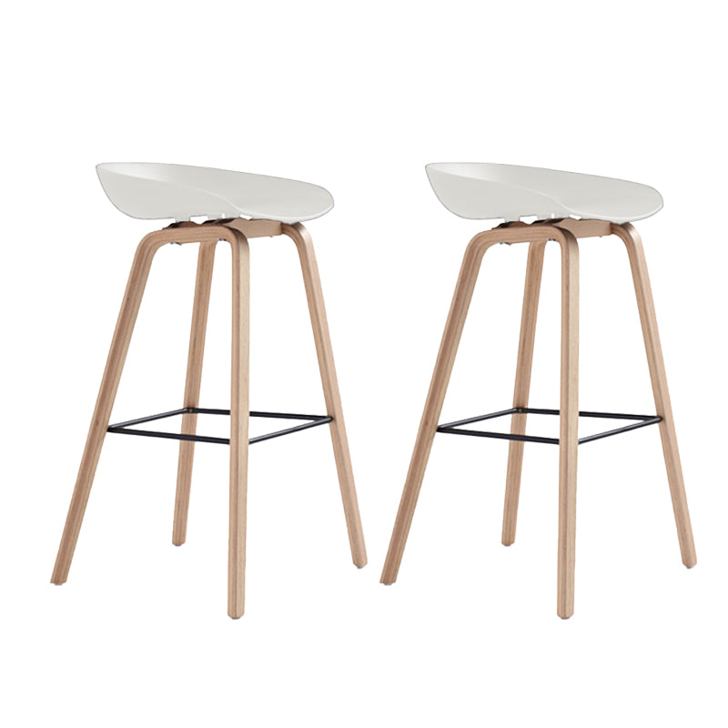 Indoor Plastic Bucket Seat Scandinavian Armless Bar Height Stool with Wood Legs White 2 Piece Set Clearhalo 'Bar Furniture' 'Bar Stools' 'bar_stools' 'furn' 'furn_bar_stools' 'Furniture' 'Kitchen & Dining Furniture' 6556328
