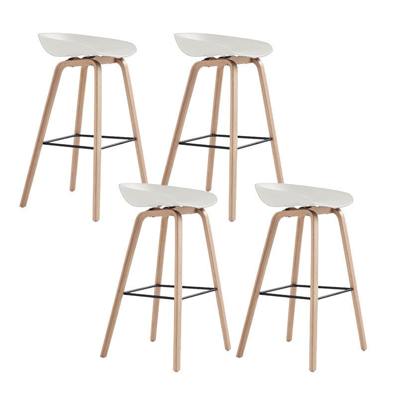 Indoor Plastic Bucket Seat Scandinavian Armless Bar Height Stool with Wood Legs White 4 Piece Set Clearhalo 'Bar Furniture' 'Bar Stools' 'bar_stools' 'furn' 'furn_bar_stools' 'Furniture' 'Kitchen & Dining Furniture' 6556329