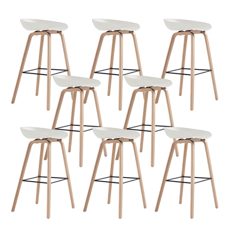 Indoor Plastic Bucket Seat Scandinavian Armless Bar Height Stool with Wood Legs White 8 Piece Set Clearhalo 'Bar Furniture' 'Bar Stools' 'bar_stools' 'furn' 'furn_bar_stools' 'Furniture' 'Kitchen & Dining Furniture' 6556331