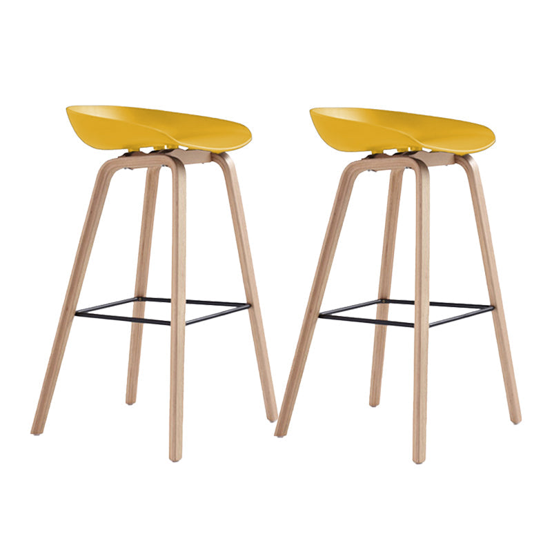 Indoor Plastic Bucket Seat Scandinavian Armless Bar Height Stool with Wood Legs Yellow 2 Piece Set Clearhalo 'Bar Furniture' 'Bar Stools' 'bar_stools' 'furn' 'furn_bar_stools' 'Furniture' 'Kitchen & Dining Furniture' 6556332