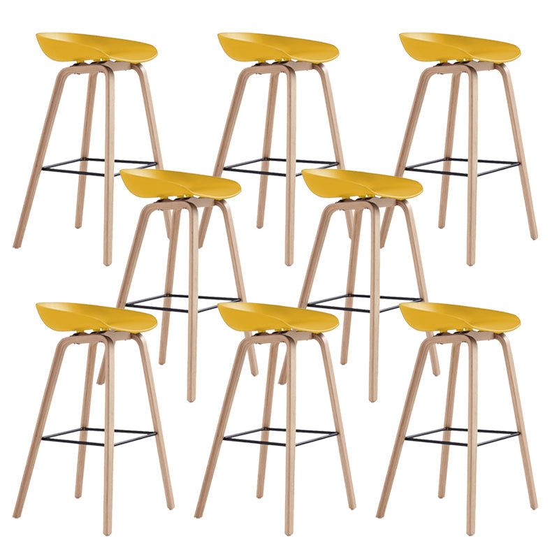 Indoor Plastic Bucket Seat Scandinavian Armless Bar Height Stool with Wood Legs Yellow 8 Piece Set Clearhalo 'Bar Furniture' 'Bar Stools' 'bar_stools' 'furn' 'furn_bar_stools' 'Furniture' 'Kitchen & Dining Furniture' 6556335