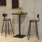 Industrieller Bistro-Stehtisch mit Sockel aus massivem Holz und Metall