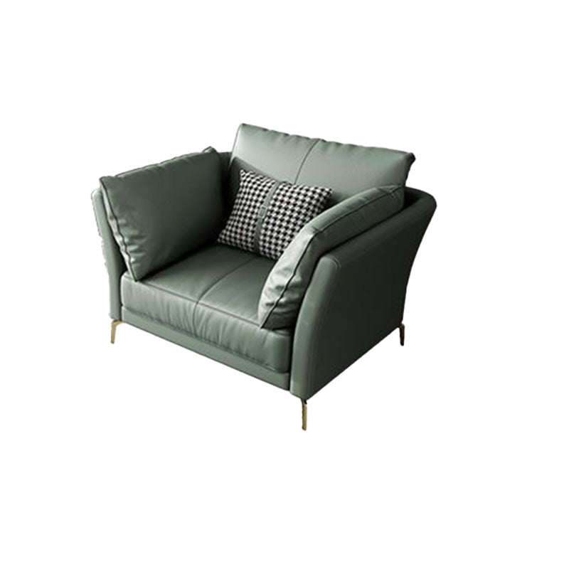 Sofá de brazo acampanado de cuero genuino lujoso sofá verde con almohadas