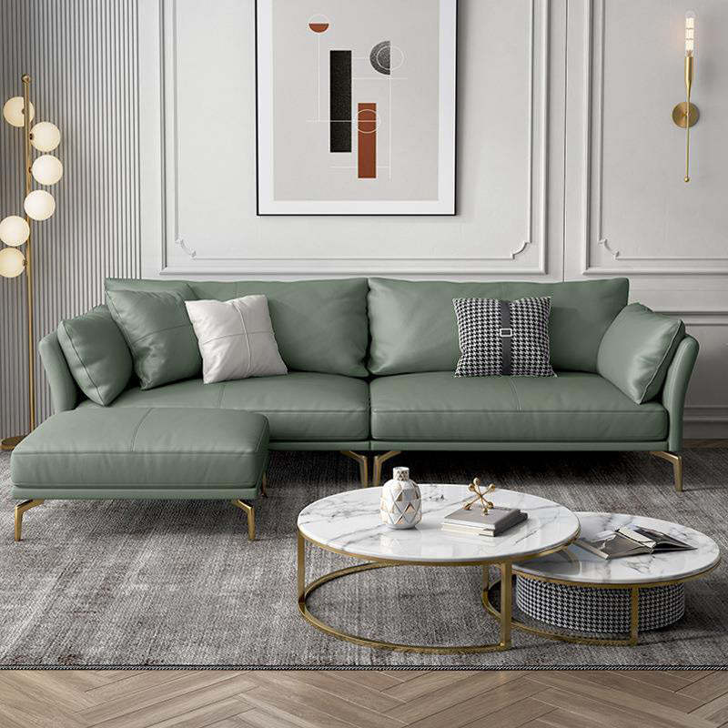 Sofá de brazo acampanado de cuero genuino lujoso sofá verde con almohadas