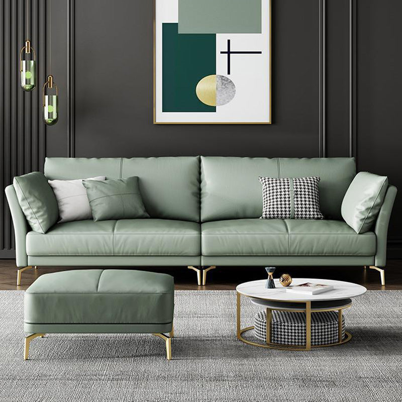 Sofá de brazo acampanado de cuero genuino lujoso sofá verde con almohadas