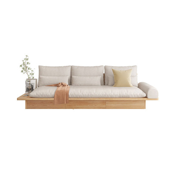 枕を備えた現代のベージュソファバックとリビングルーム用の引き出し